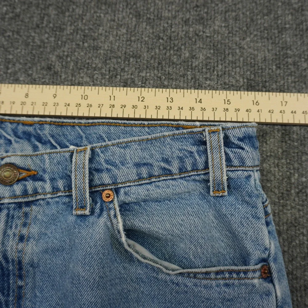 Vintage Levis 550 Relaxed Fit Tapered Mens Light Wash Orange Tab Jeans 34x32 90s
